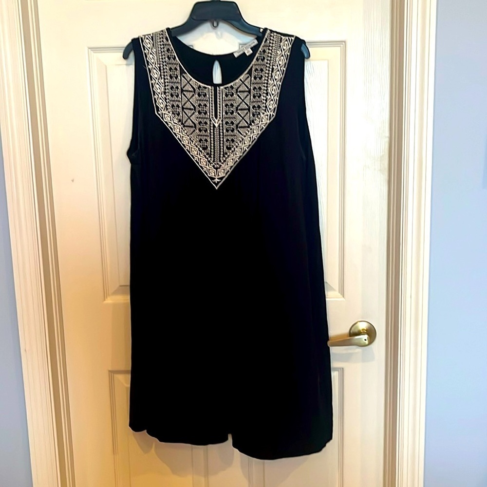 # Sleeveless 1X embroidered black shift dress